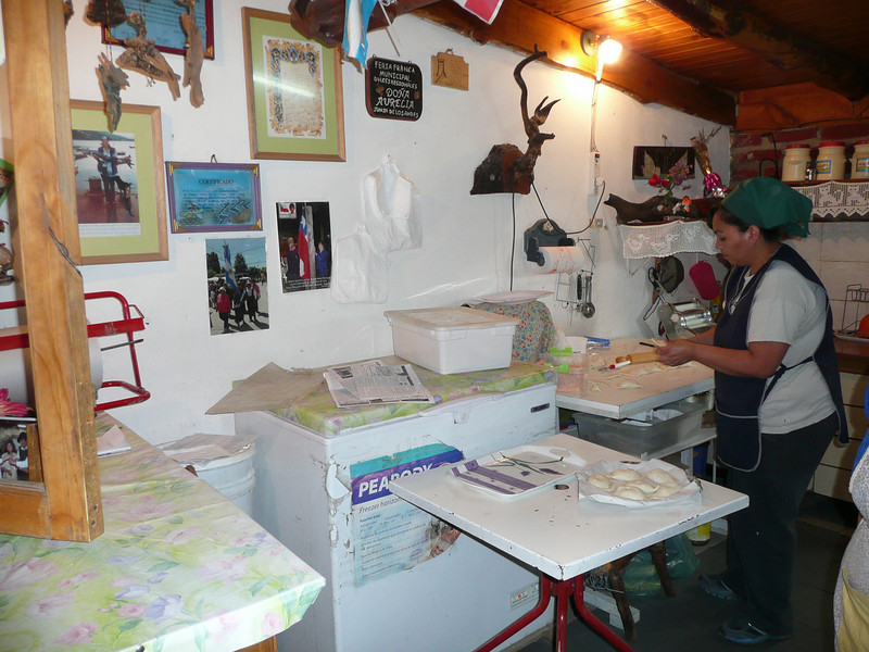 Aurelia's daughter cooking our empanadas.